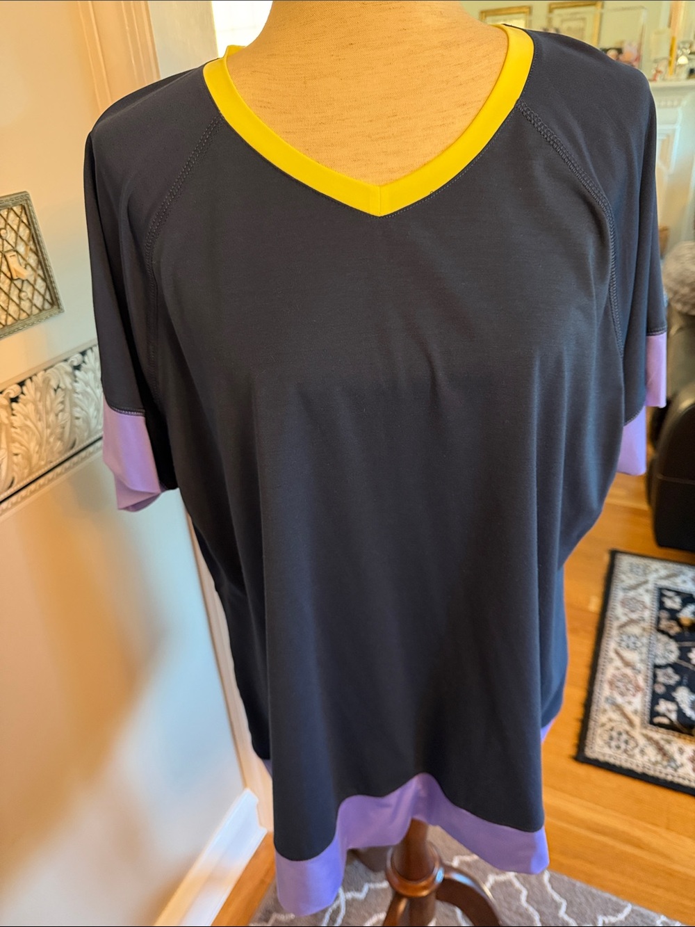 Like new PWomen's Black V-Neck Top with Yellow Trim and Lavender Accents